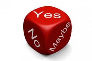 Game dice with Yes, No, and Maybe on the Face